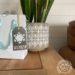 snowflake gift tag on gift bag