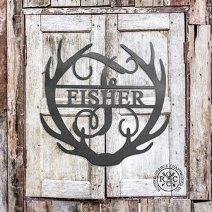 Antler monogram on wooden doors