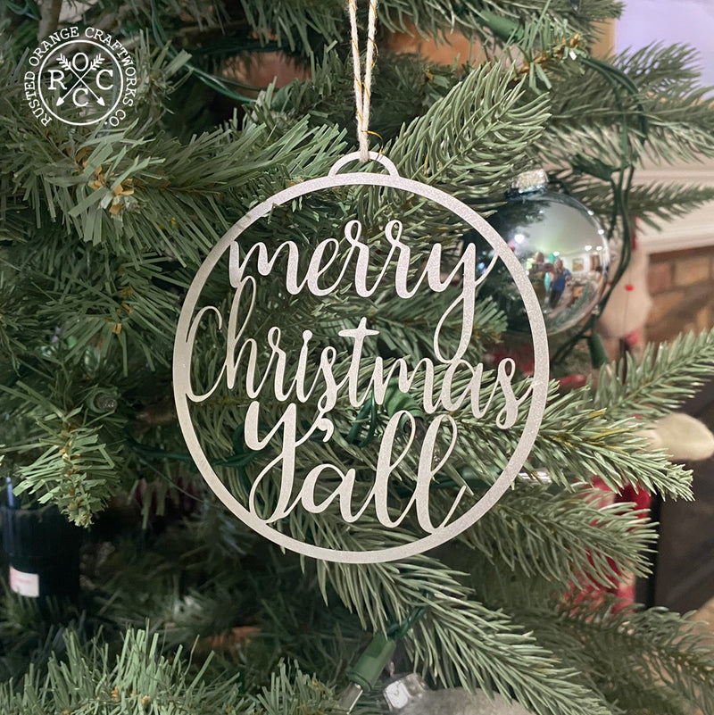 merry christmas yall ornament hanging on christmas tree