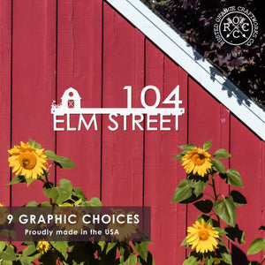 house numbers on red barn wall