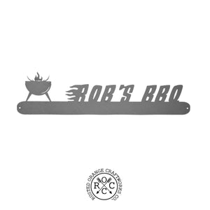 grill style grill utensil holder that says "bob's bbq"