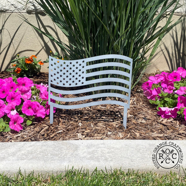 American flag stake in garden