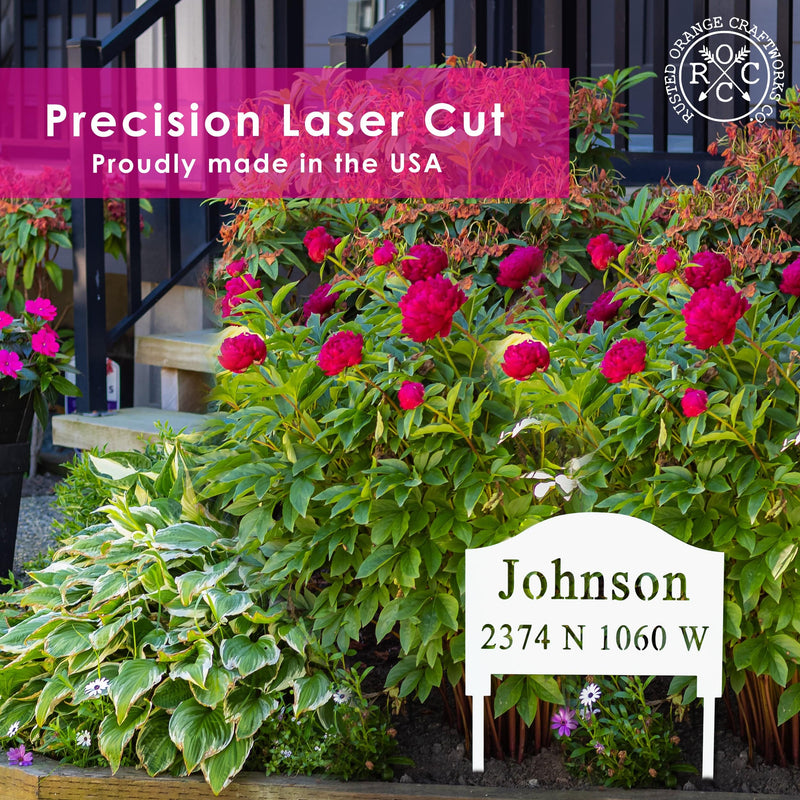 address yard sign with stake in front yard garden with banner that reads "precision laser cut proudly made in the USA"