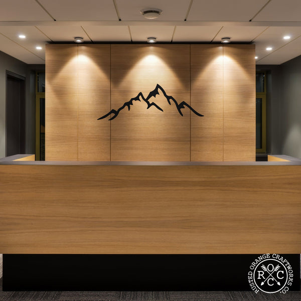 mountain metal wall art in lobby