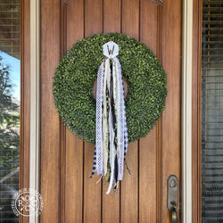 wreath badge on front door wreath