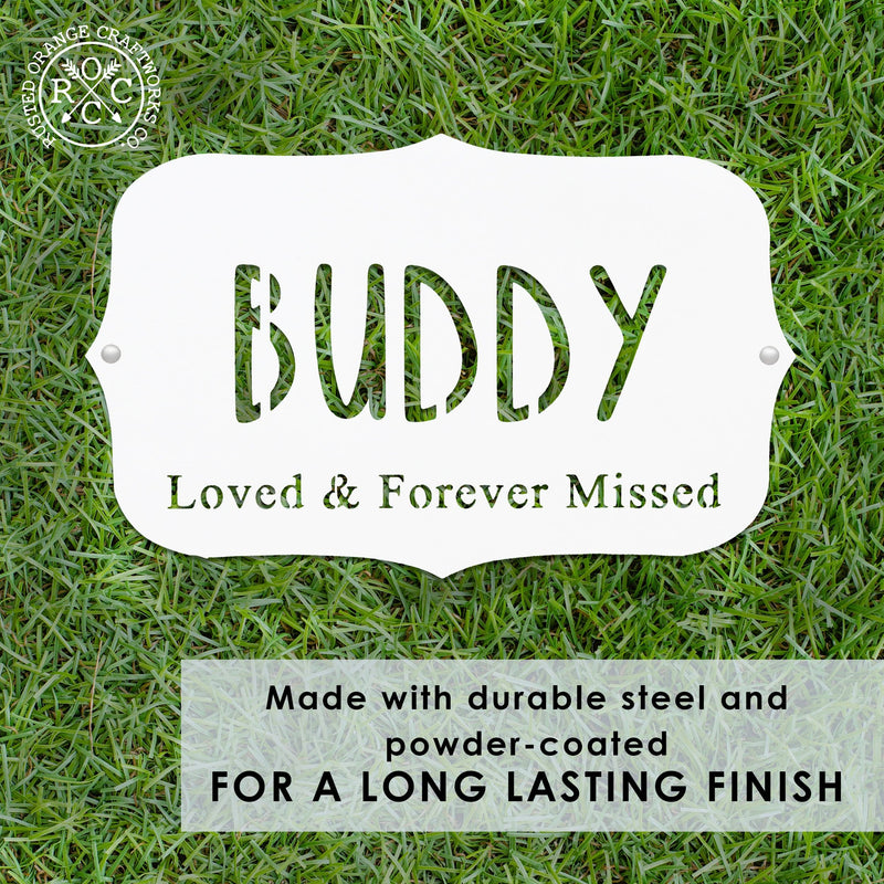 pet memorial plaque laying flat on the grass