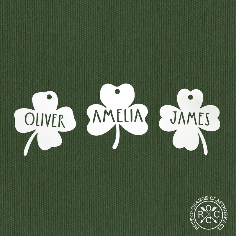 Rusted Orange Craftworks Co. Seasonal & Holiday Decorations Personalized Shamrock Name Tags – Set of 3 Custom Metal Clover Cutouts