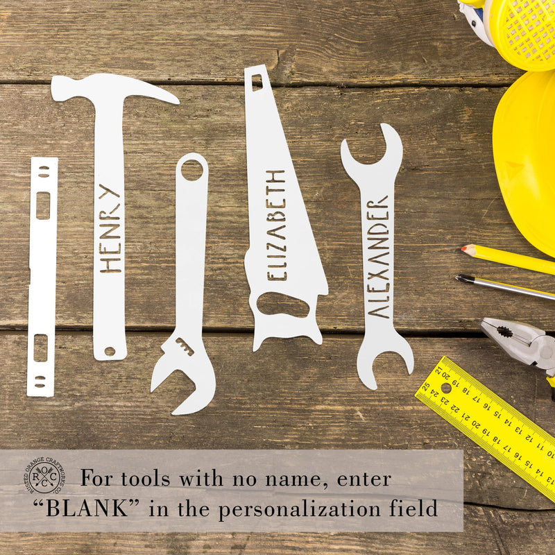 5 tools with names on table with banner that says "For tools with no name, enter 'BLANK' in the personalization field"