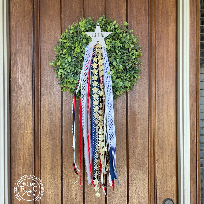 wreath badge on front door wreath est 1776 style