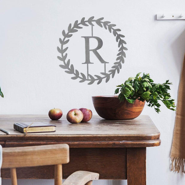 monogram on wall in dining room