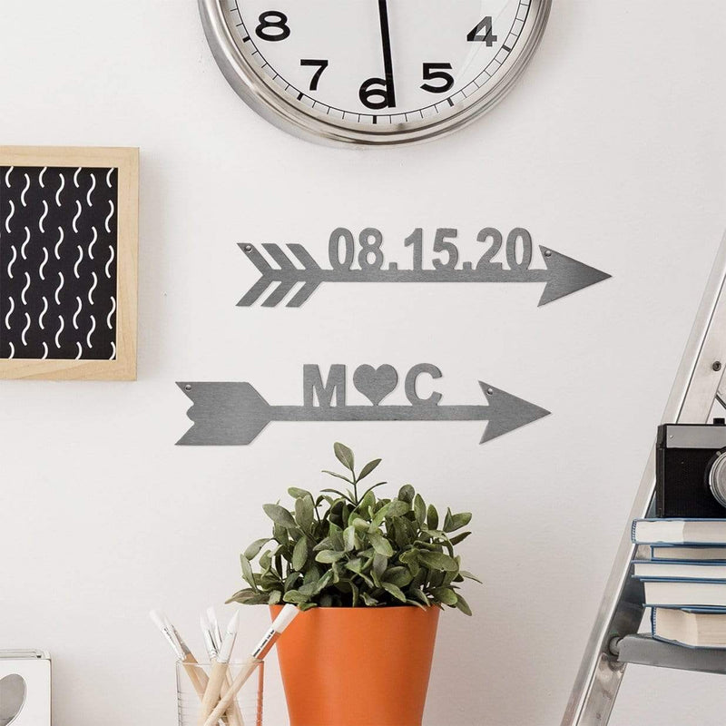 Arrow signs on wall