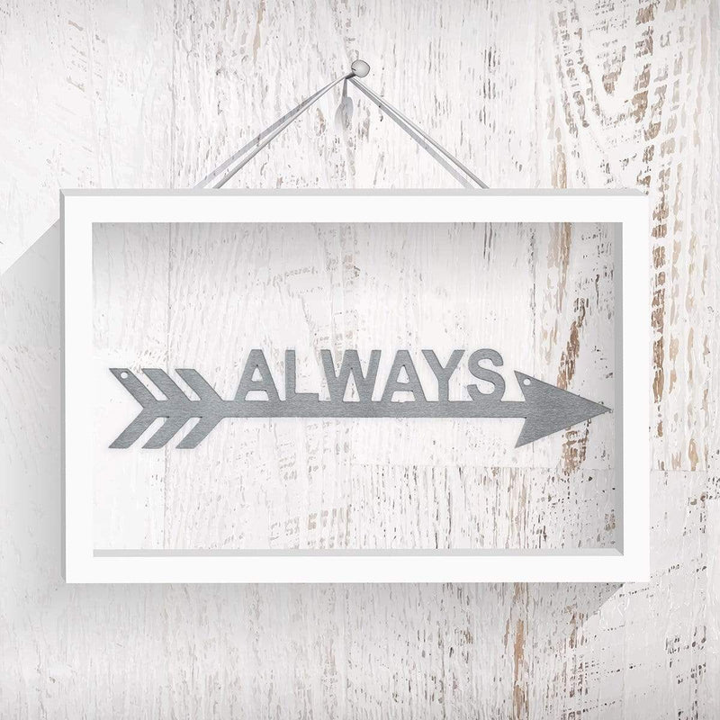 arrow sign on wall in frame