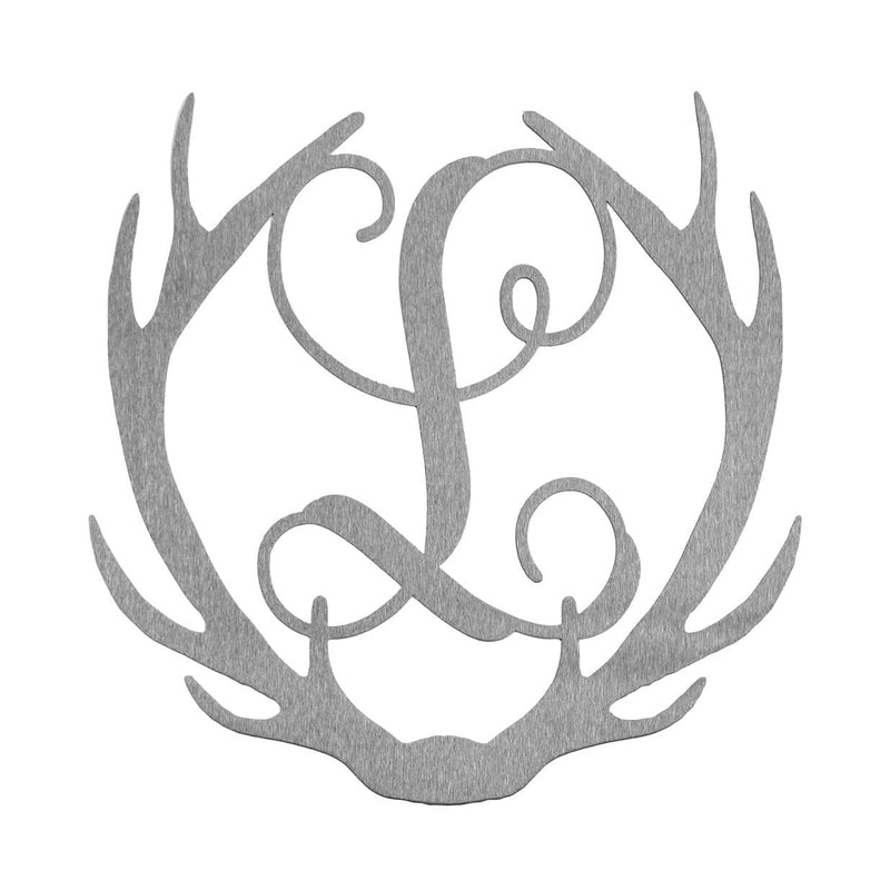 Metal deer antlers with monogram L in the middle, shown against white background.