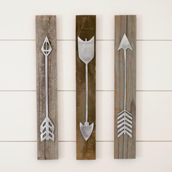 metal arrows hanging on wall