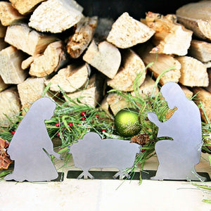 nativity set by fireplace