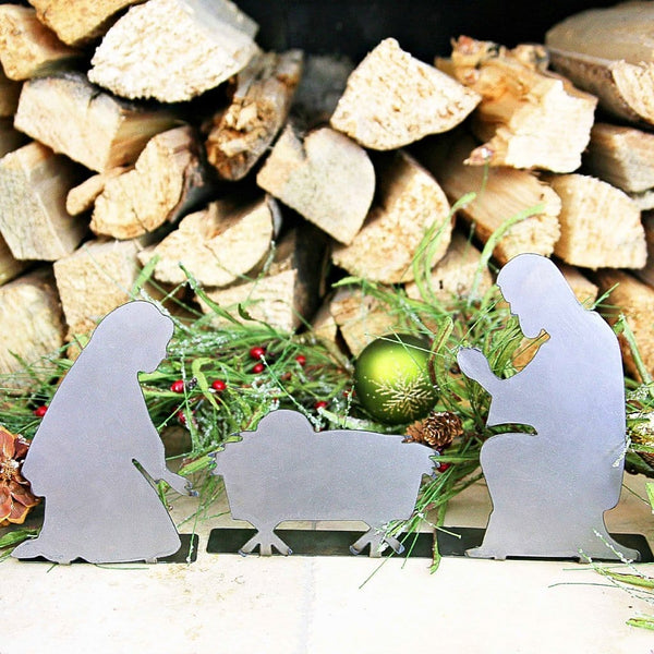 nativity set by fireplace