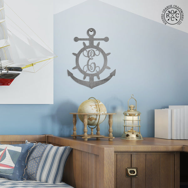 Anchor monogram on wall in nautical themed room