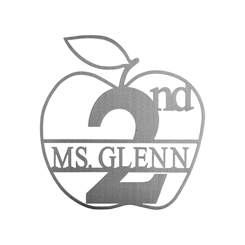 Apple shaped sign with name and monogram in the middle, shown against white background.