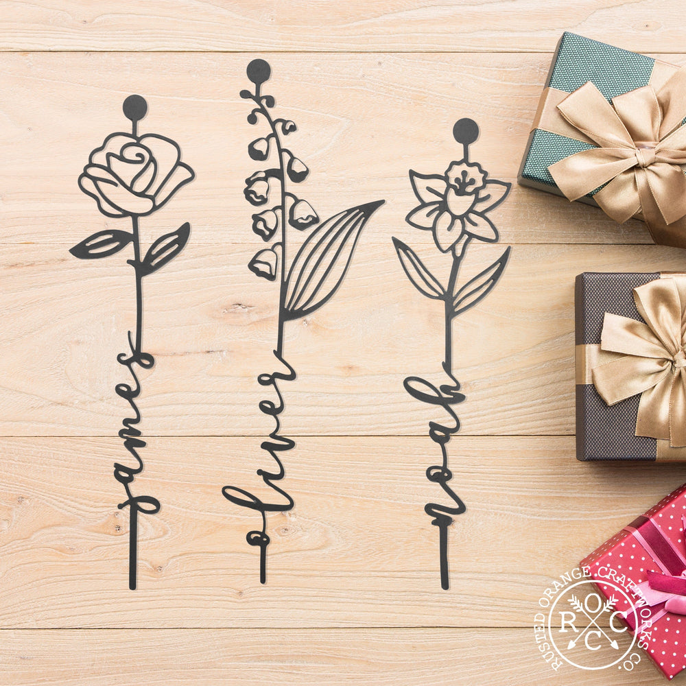 3 metal flowers on the table
