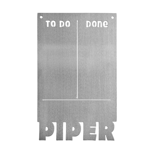 Magnetic board with to do and done etched on top and custom name at bottom, shown against white background.