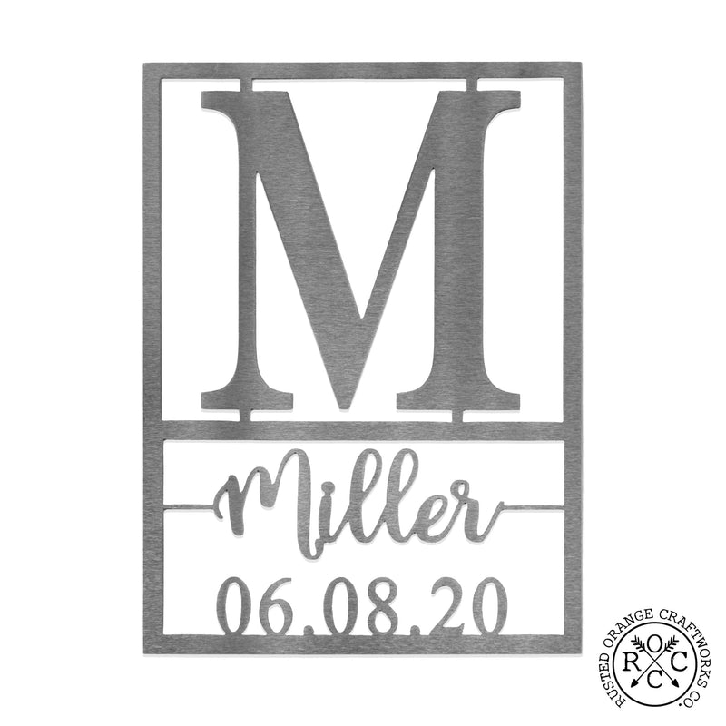 Personalized metal sign with monogram, name, and date against white background.