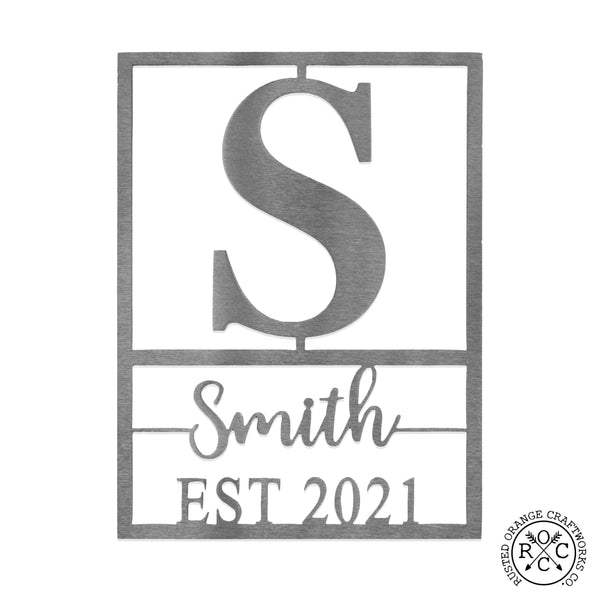 Personalized metal sign with monogram, name, and established date against white background.