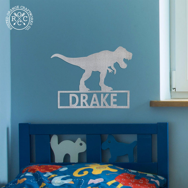 dinosaur sign above kids bed