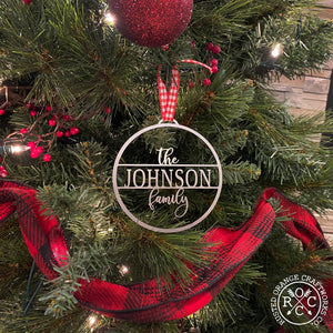family name personalized ornament on christmas tree