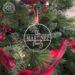 family name personalized ornament on christmas tree