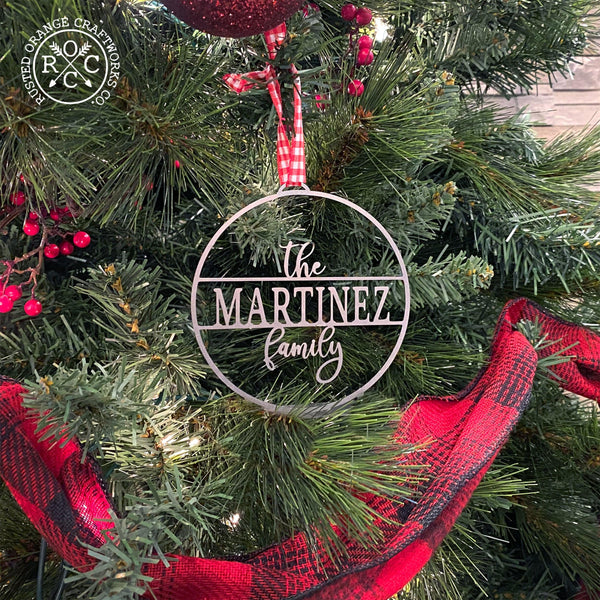 family name personalized ornament on christmas tree