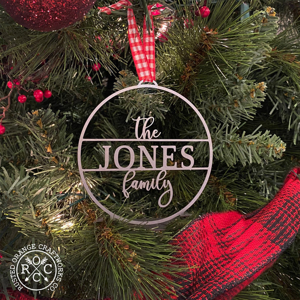 family name personalized ornament on christmas tree