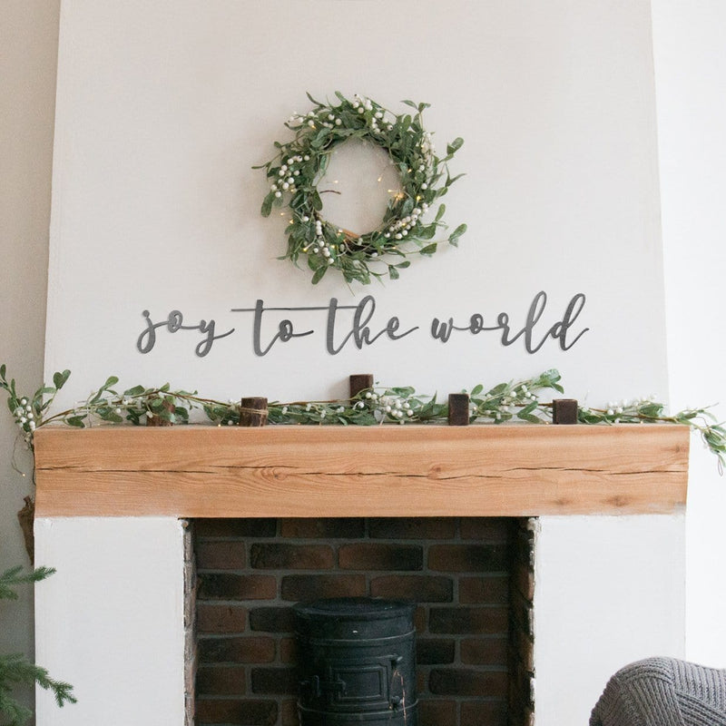 Joy To the world sign on wall