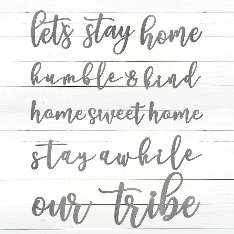 Metal farmhouse quote signs against white background.