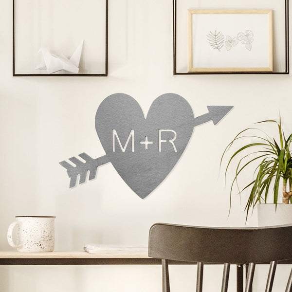 heart arrow initial sign