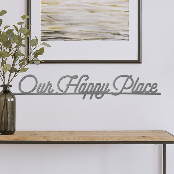 our happy place sign on wall