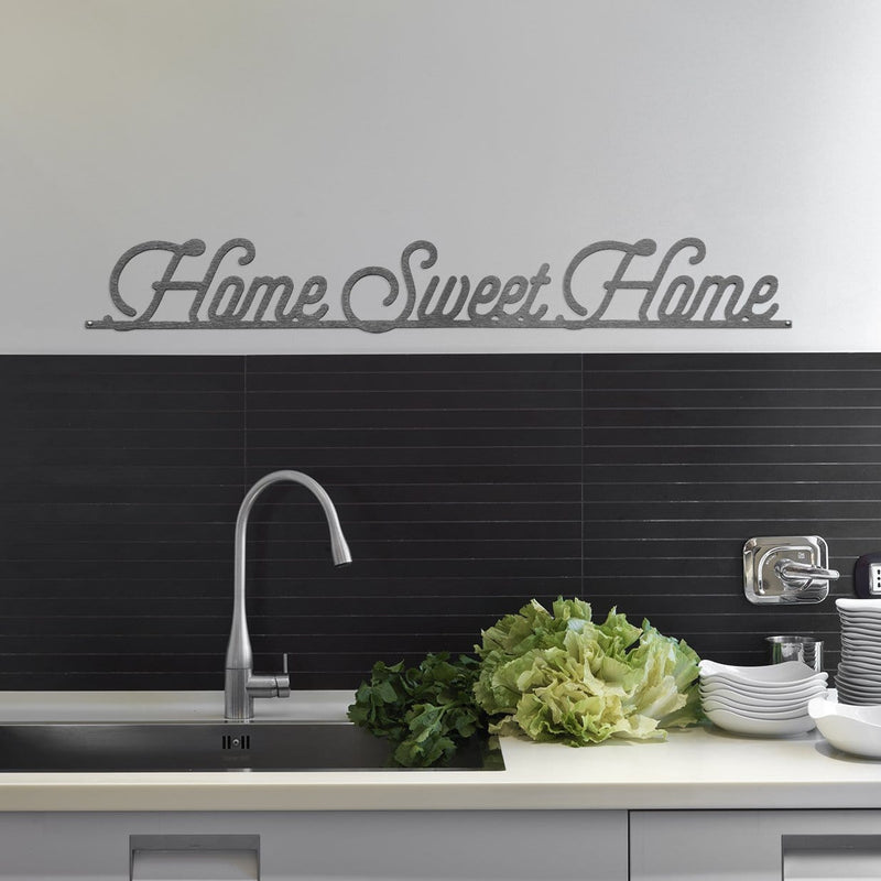 home sweet home sign on wall in kitchen