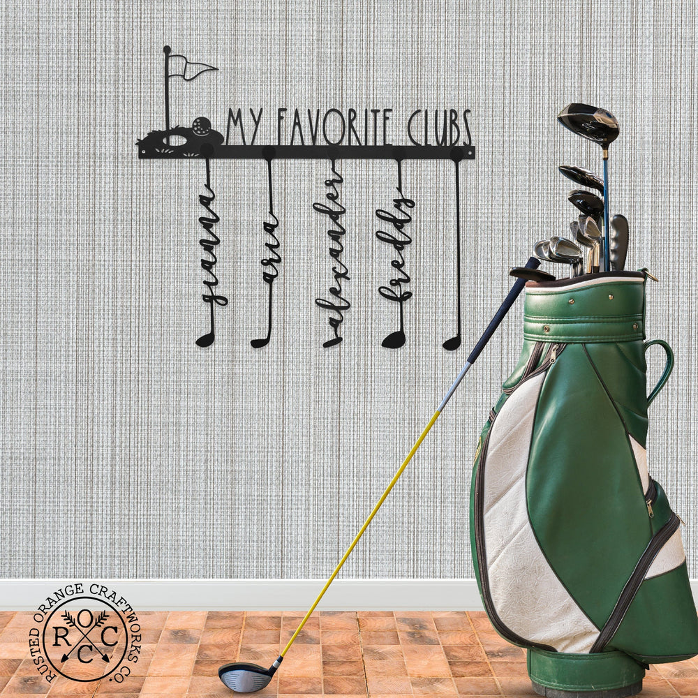 Golf club signs on wall next to golf club bag