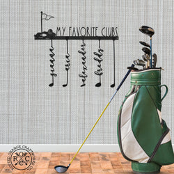 Golf club signs on wall next to golf club bag