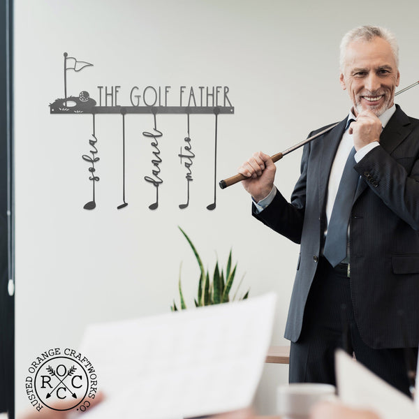 golf club signs on wall next to man holding real golf club