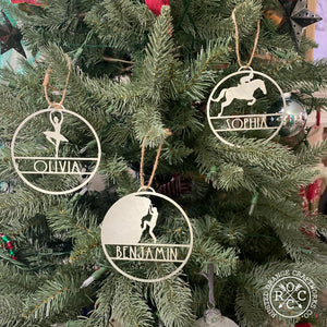 sports ornaments hanging on Christmas tree