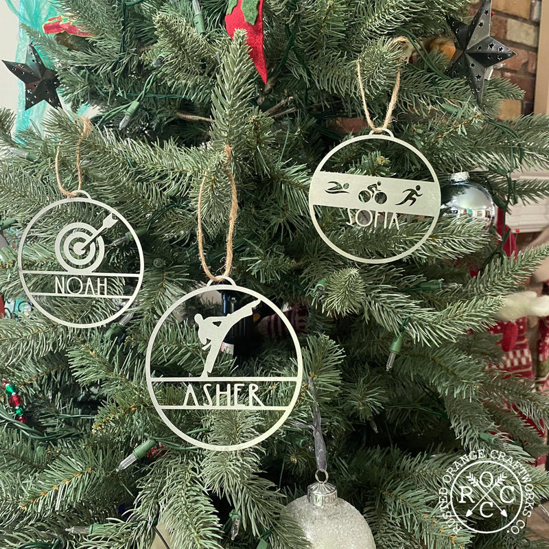 sports ornaments hanging on Christmas tree