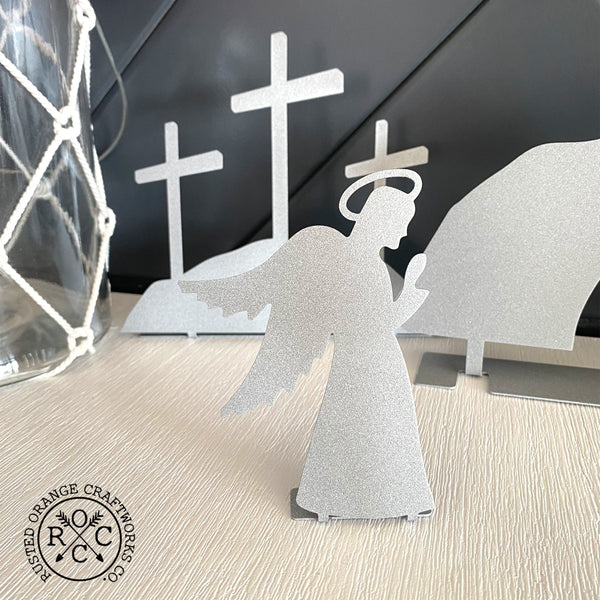 Angel and crosses on mantle