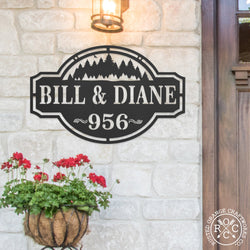 home on the range address plaque on wall by front door