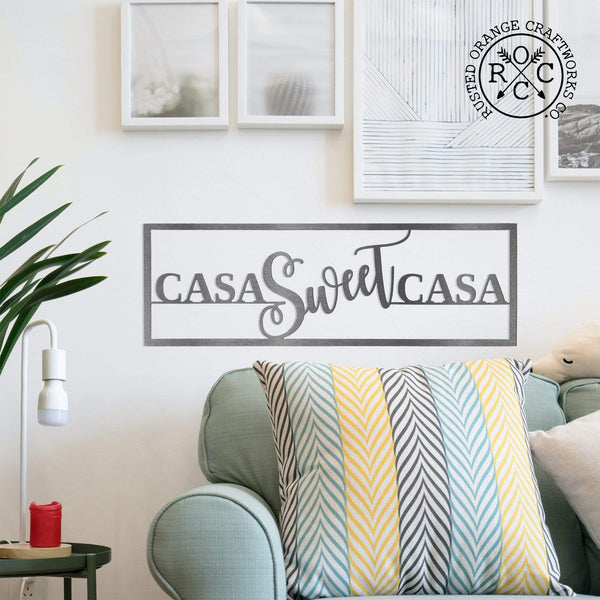 casa sweet casa above couch
