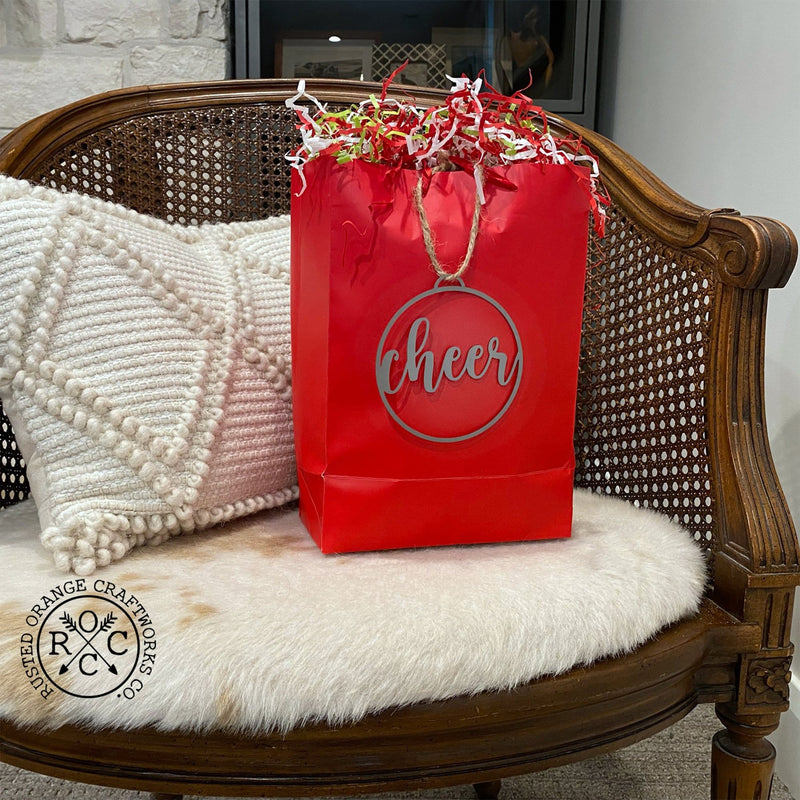 cheer ornament on gift bag