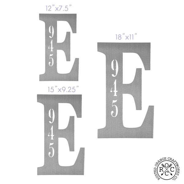3 metal letters with house number inscribed showing size comparison.