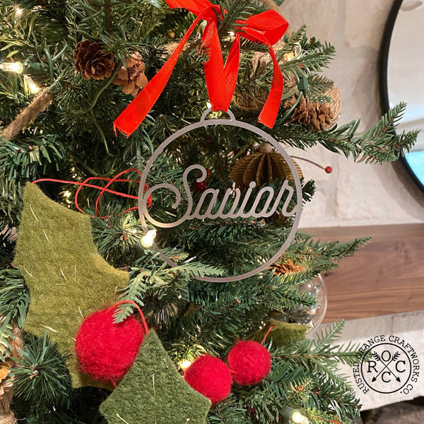savior ornament on christmas tree