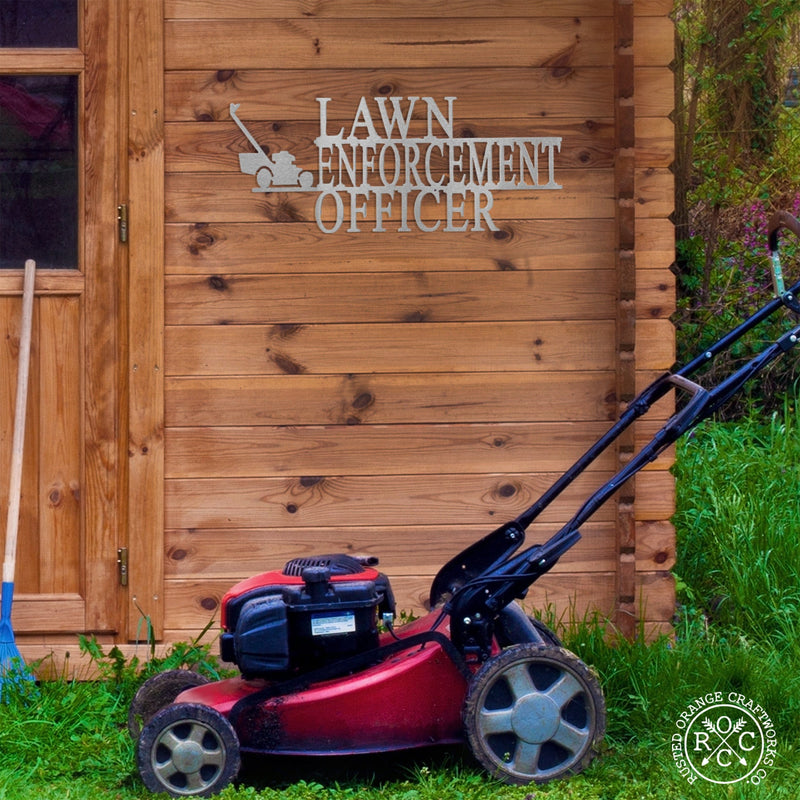 lawn enforcement officer above lawn mower