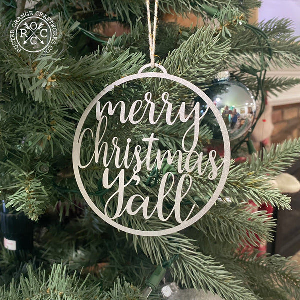 merry christmas yall ornament hanging on christmas tree