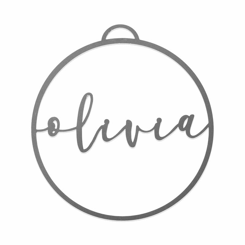Circle metal ornament with name across center shown against white background.
